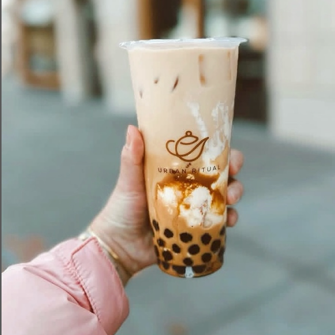 Image of a hand holding a boba tea from Urban Ritual