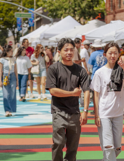 people walking around b street during HEAD WEST Marketplace