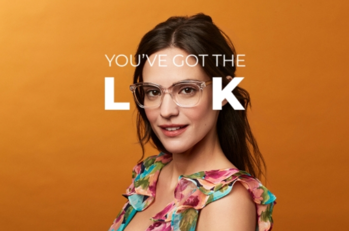 Photo of a young lady wearing glasses.