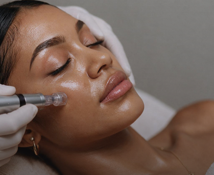 photo of a woman receiving a facial